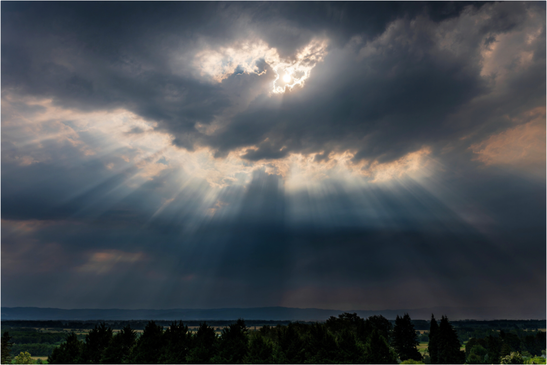 Main image Sunbeams Breaking Through the Storm